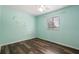 This bedroom includes wall art and window at 4548 Barrister Dr, Clermont, FL 34711