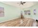 Bright bedroom with wood floors and ample natural light at 4548 Barrister Dr, Clermont, FL 34711