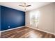 This bedroom has lots of space and a ceiling fan at 4548 Barrister Dr, Clermont, FL 34711