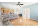 An open living room showing the dining area and kitchen with plenty of light at 4548 Barrister Dr, Clermont, FL 34711