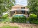 Spacious backyard with a screened pool and ample green space, fenced in for privacy at 4548 Barrister Dr, Clermont, FL 34711