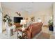 Spacious living room featuring comfortable seating, a large television, and stylish decor at 5311 Eads Ter, The Villages, FL 32163