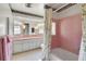 A charming full bathroom with tiled walls, and a traditional vanity at 5319 Eagles Nest Rd, Fruitland Park, FL 34731