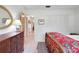 Bedroom featuring wood furniture and white walls, providing a clean, classic feel at 5319 Eagles Nest Rd, Fruitland Park, FL 34731