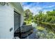 Exterior view of the boat lift house and access to the canal at 5319 Eagles Nest Rd, Fruitland Park, FL 34731