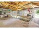 A peek inside the boat lift house with exposed wooden support beams at 5319 Eagles Nest Rd, Fruitland Park, FL 34731