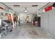 Spacious garage with ample room for vehicles, storage, and workshop area at 5319 Eagles Nest Rd, Fruitland Park, FL 34731