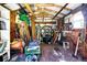 Interior view of a storage shed filled with tools and equipment for home maintenance and projects at 5319 Eagles Nest Rd, Fruitland Park, FL 34731
