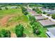 Aerial view of a beautiful home near green space and other homes in the neighborhood at 6906 Glenbrook Dr, Lakeland, FL 33811