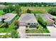 Lovely single-story home with landscaped yard, stone accents, and serene backyard views at 6906 Glenbrook Dr, Lakeland, FL 33811
