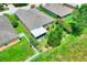 Aerial view of backyard, home and surrounding area within a well manicured neighborhood at 6906 Glenbrook Dr, Lakeland, FL 33811