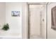 Bright bathroom featuring a tub, shower and an art piece on the wall at 6906 Glenbrook Dr, Lakeland, FL 33811