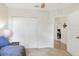 Bedroom with closet, daybed and doorway to another room at 6906 Glenbrook Dr, Lakeland, FL 33811