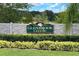 Elegant community sign for Glenbrook Chase with lush landscaping and stone accents at 6906 Glenbrook Dr, Lakeland, FL 33811