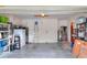 Spacious two-car garage with shelving and room for storage or projects at 6906 Glenbrook Dr, Lakeland, FL 33811