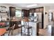 Well-equipped kitchen featuring stainless steel appliances and a convenient breakfast bar seating area at 6906 Glenbrook Dr, Lakeland, FL 33811