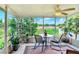 Inviting sunroom with rocking chairs and views of the outdoor area at 6906 Glenbrook Dr, Lakeland, FL 33811