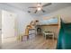 bedroom with a custom built in loft bed, storage, and a fun slide feature at 7921 Sebago Ct, Orlando, FL 32835