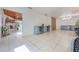 Open-concept living area with custom built-in workspace, fireplace and views into living area at 7921 Sebago Ct, Orlando, FL 32835