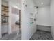 The bathroom features a walk-in shower, a convenient built-in bench, and storage niche at 7921 Sebago Ct, Orlando, FL 32835