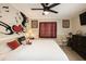 Unique bedroom with a bed, graphic wall art, and neutral decor at 999 W Juniata St, Clermont, FL 34711