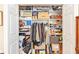 Walk-in closet with storage shelving and rods offers ample space for organizing belongings at 1065 Berg Ct, The Villages, FL 32162