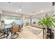 Spacious sunroom with tile floors, comfortable seating, and lots of natural light at 1065 Berg Ct, The Villages, FL 32162