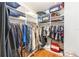 Spacious walk-in closet with custom shelving and ample storage at 1065 Berg Ct, The Villages, FL 32162