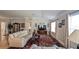 Living room featuring hardwood floors, furniture, television, and plenty of natural light at 1105 San Remo Ln, Lady Lake, FL 32159