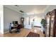 Office space with desk, hardwood floors, columns, and an entry into the front entry at 1105 San Remo Ln, Lady Lake, FL 32159