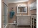 Bathroom featuring an updated vanity and shower at 11926 Milan Way, Leesburg, FL 34788