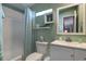 Bathroom showcasing a shower-tub combo and stylish decor at 11926 Milan Way, Leesburg, FL 34788