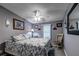 Charming bedroom with wood-look flooring and soft colors at 11926 Milan Way, Leesburg, FL 34788