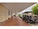 Spacious carport with a golf cart parked, covered to protect from the weather at 11926 Milan Way, Leesburg, FL 34788