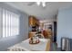 Cozy kitchen with a breakfast nook and wooden cabinets, bathed in natural light from nearby window at 11926 Milan Way, Leesburg, FL 34788