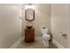 Charming half-bath with designer sink and fixtures at 1325 Otters View Ct, Fruitland Park, FL 34731