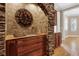 Gourmet kitchen boasts granite countertops, custom cabinetry, and a stone archway feature at 1325 Otters View Ct, Fruitland Park, FL 34731