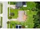 An aerial view of a well-maintained single Gathering home with a lawn at 1415 Braebury Dr, Leesburg, FL 34748