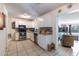Modern kitchen with white cabinetry, stainless steel appliances, and stylish tile backsplash at 1415 Braebury Dr, Leesburg, FL 34748