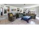 Bright living room featuring comfortable seating, ample space, and access to outdoor areas at 1415 Braebury Dr, Leesburg, FL 34748