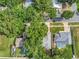 Residential property with lush landscaping, swimming pool, and well-maintained surroundings at 1511 W Magnolia St, Clermont, FL 34711