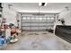 Spacious garage with an automatic door provides ample parking and storage space at 1511 W Magnolia St, Clermont, FL 34711