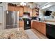 Well-appointed kitchen featuring granite countertops and modern stainless steel appliances at 1511 W Magnolia St, Clermont, FL 34711