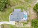 Aerial view of a private backyard featuring a large in-ground pool and mature landscaping at 15629 Catherine Cir, Groveland, FL 34736