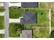 Aerial view of a residence showing its roof, backyard, and the surrounding neighborhood at 1620 6Th Ave, Deland, FL 32724