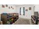 bedroom with themed decor, a bunk bed with toy storage, and light colored floors at 1620 6Th Ave, Deland, FL 32724
