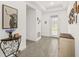 Stylish entryway featuring tiled floors, modern decor, and a well-lit, welcoming ambiance at 1620 6Th Ave, Deland, FL 32724