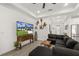 Bright living room features recessed lighting, ceiling fan, and comfortable sectional sofa with an open concept floor plan at 1620 6Th Ave, Deland, FL 32724