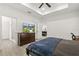 Bedroom features a ceiling fan, recessed lighting, and an ensuite bathroom with a glass door shower at 1620 6Th Ave, Deland, FL 32724