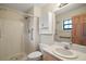 A bathroom with a shower, light walls, and vanity at 16318, 16250 & 16300 County Road 448, Mount Dora, FL 32757